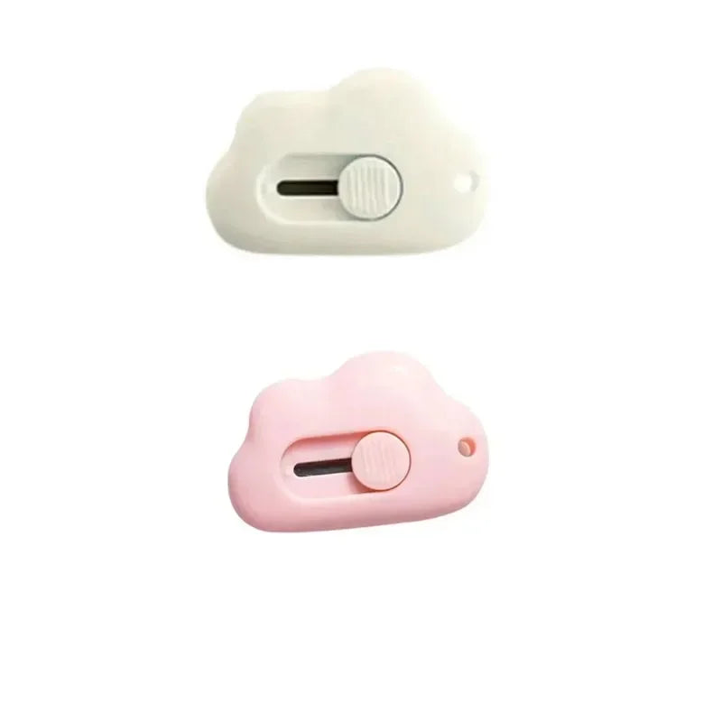 A white portable rabbit cloud letter opener and crafting tool with a round opening mechanism.