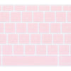 A close-up view of a light pink silicone keyboard cover for a laptop.