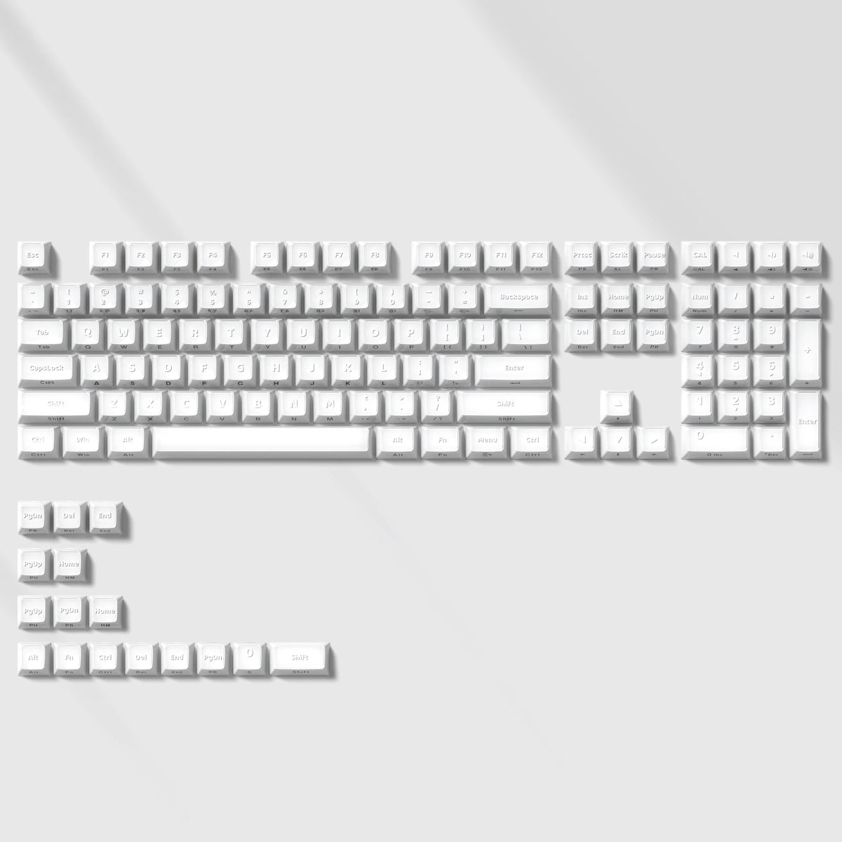 A layout of custom printed jelly keycaps for mechanical keyboards, showing various letter and symbol keys.