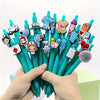 A hand holds a pack of medical theme ballpoint pens featuring various nurse and first aid icons.