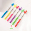 A set of colorful telescopic stainless steel teaching pointers with various colored tips.