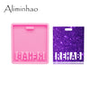 A pink silicone resin mold with the word ALIMINHAO embossed on it next to a purple glitter mold.