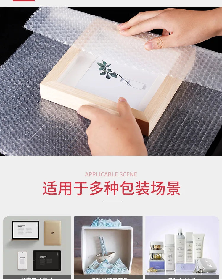 Hands are placing a wooden box containing a delicate item wrapped in bubble wrap onto a textured surface.