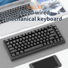 A close-up view of the black AJAZZ AK820 wired mechanical keyboard with a rotary volume knob.