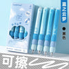 A set of four blue erasable gel pens with soft grips and black ink visible in a box.