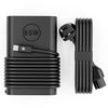 Adaptador de corriente USB Tipo-C negro de 65W para portátil con cable enrollado y conector.