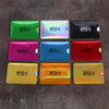 Five colored aluminum card holders with RFID protection displayed against a dark background.