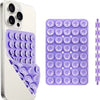 A white smartphone case and a purple silicone suction cup phone mount with multiple suction cups.