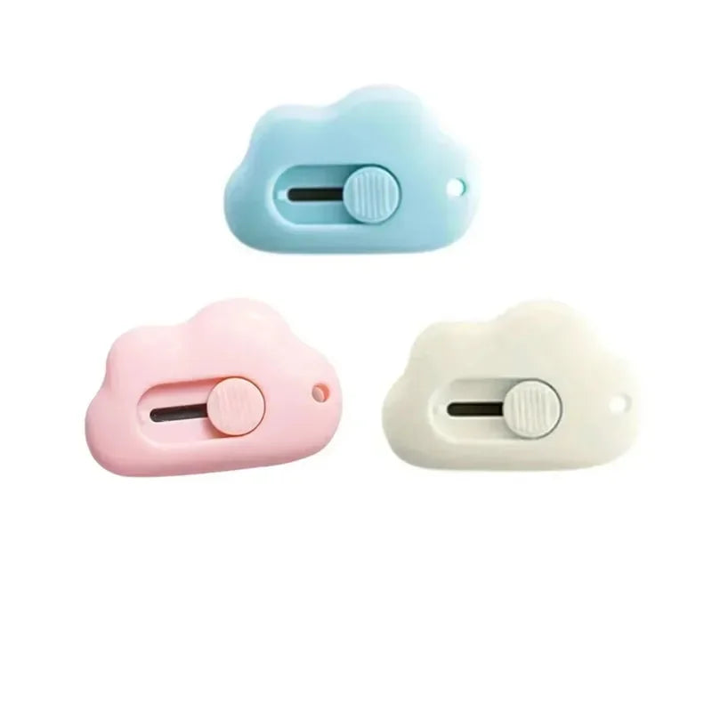 Two light blue and white plastic tools for opening letters or crafting, featuring a sliding mechanism.