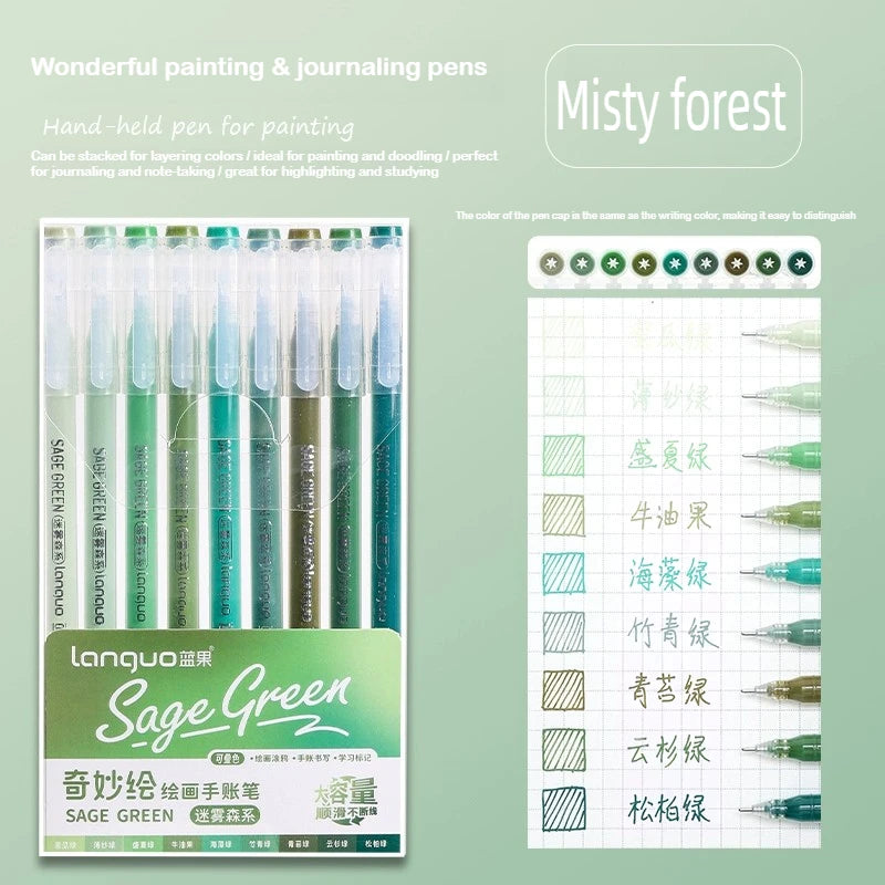 A set of hand-held painting and journaling pens in various shades of green, packaged for art and doodling.
