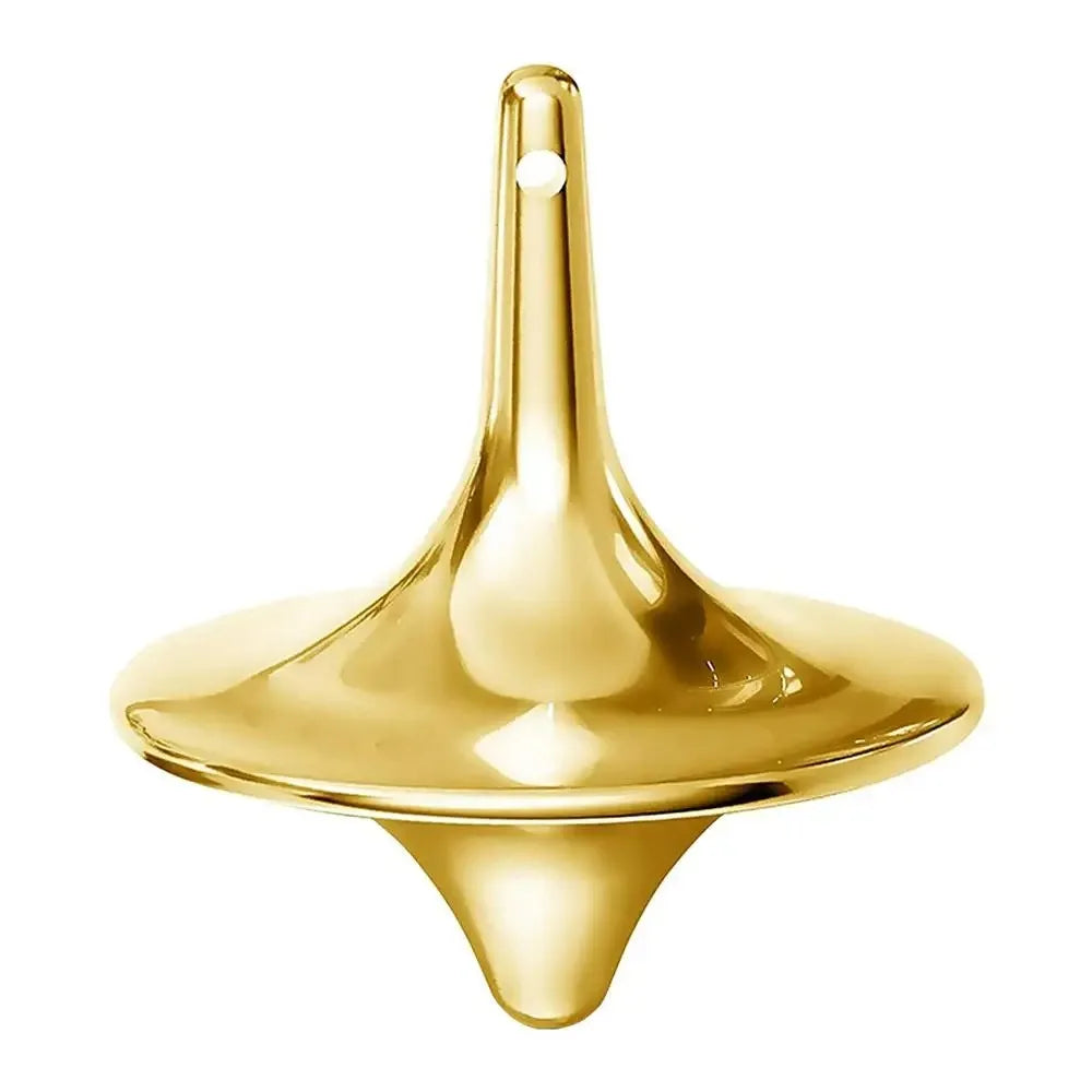 A gold metal hand spinning top fidget toy with a pointed base and a small stud on top.