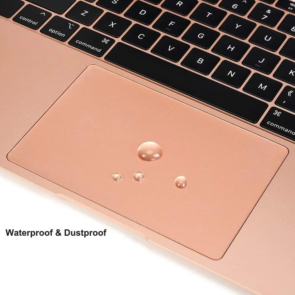 A close-up view of a rose gold trackpad protector for a MacBook, highlighting waterproof and dustproof features.