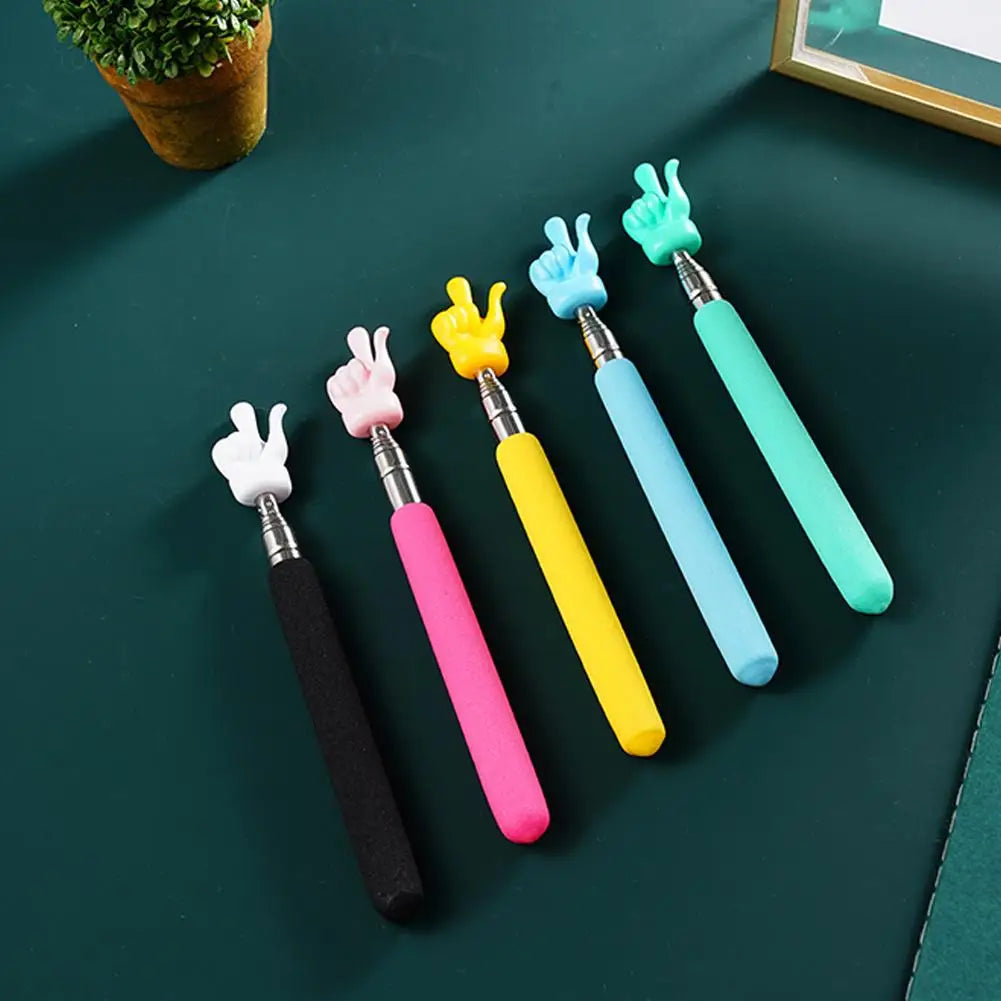 A set of colorful retractable hand pointer sticks with various colored tips and grips on a dark green surface.