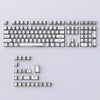 A full set of translucent PBT keycaps with side printing in a cherry profile layout for a mechanical keyboard.