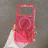 A hand holds a clear pink glitter shockproof magnetic case for an iPhone with a circular cutout.