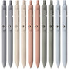 A collection of smooth fine tip gel pens in various shades of gray and pink