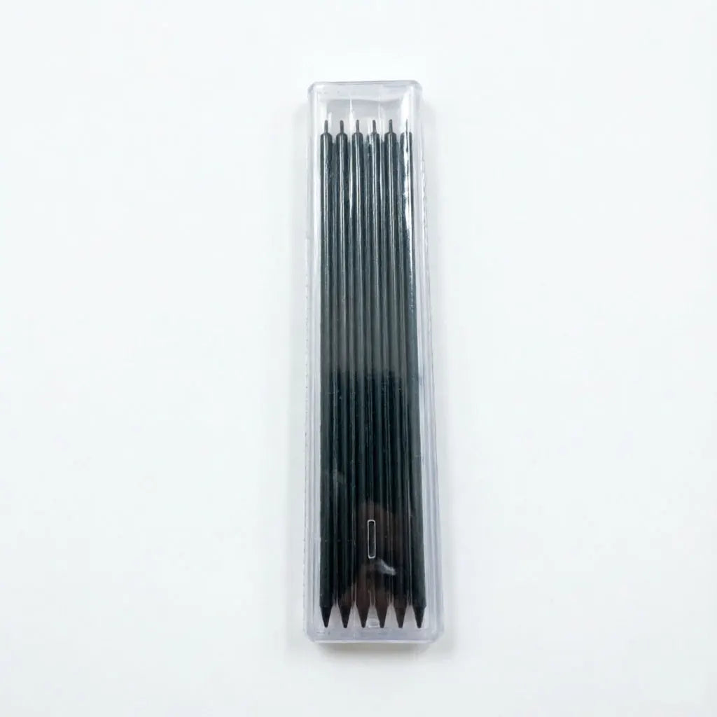 A clear plastic container holding a set of black woodworking marker pencils.