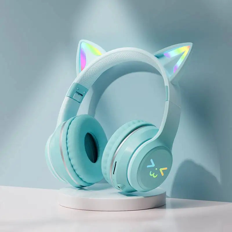 Light blue gradient RGB cat ear Bluetooth headphones displayed on a white stand.
