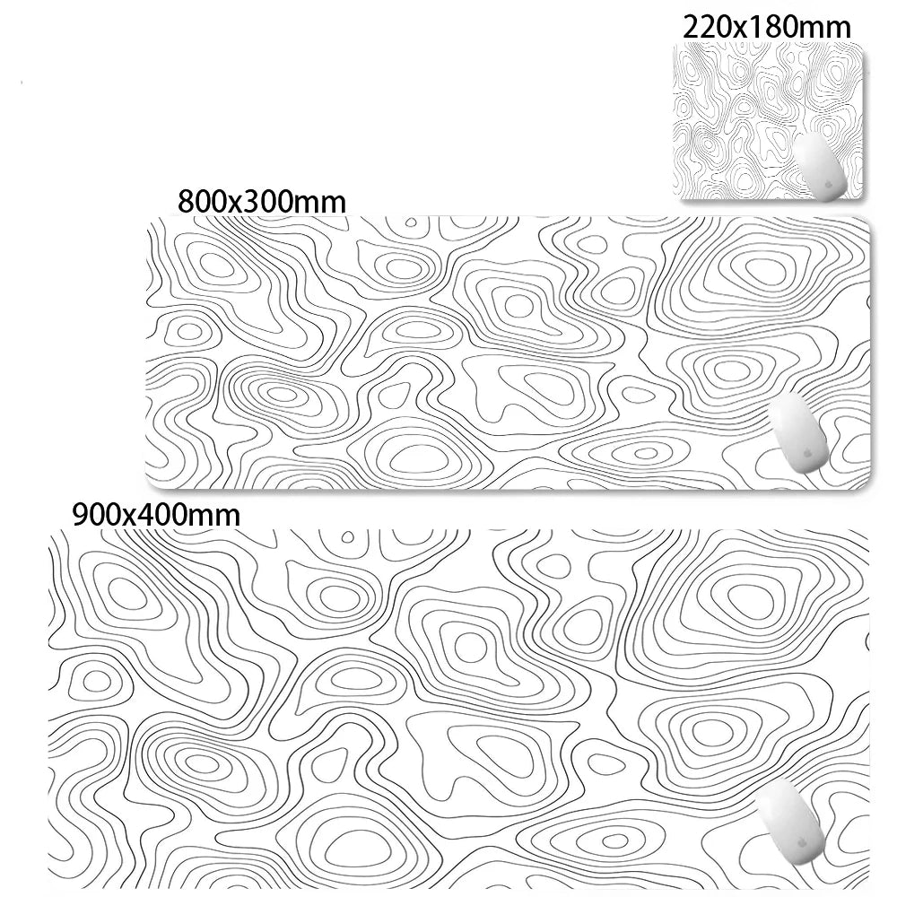 Abstract desk mat featuring contour lines with a white oval shape.