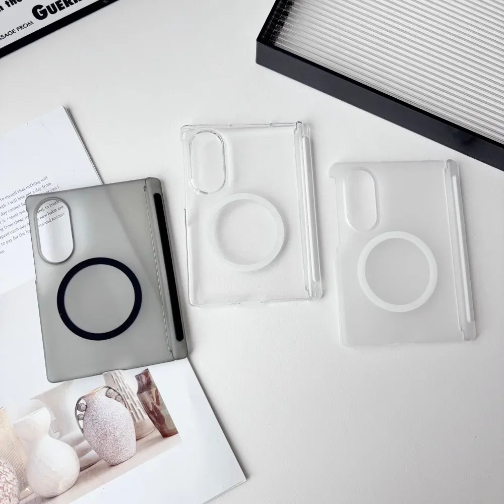 Clear silicone phone cases and a black case displayed on a white surface.