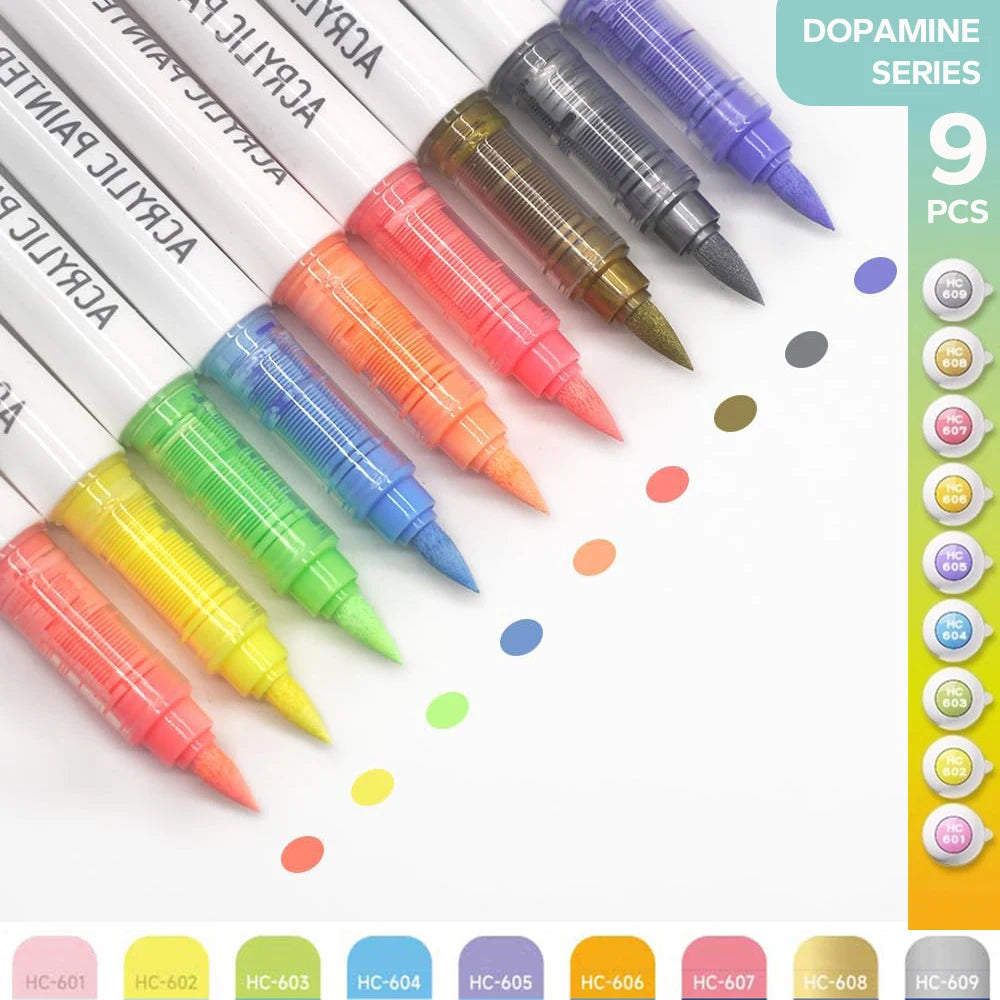 A set of nine colorful acrylic brush markers with automatic ink control in various shades arranged diagonally.