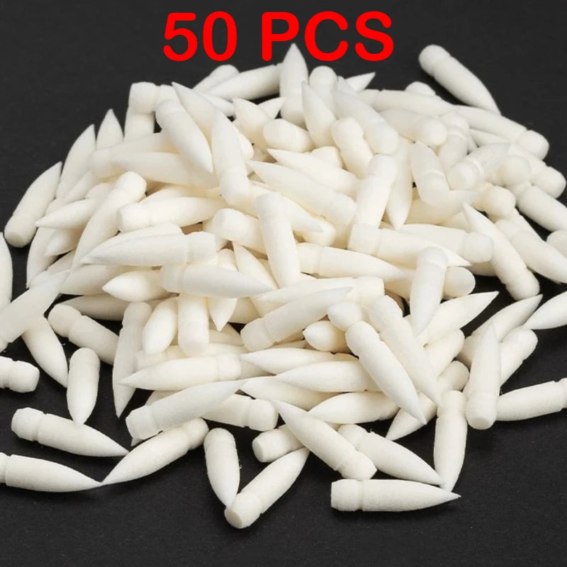 A pile of 50 white acrylic art markers in various shapes and sizes.