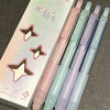 A pack of four pastel gradient gel pens in black ink, labeled Super Black 0.5mm.