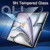 A close-up view of a tablet screen protected by 9H tempered glass, showing the clarity and strength of the protector.