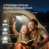 A man and a girl are outdoors using a handheld flashlight feature on a fan.