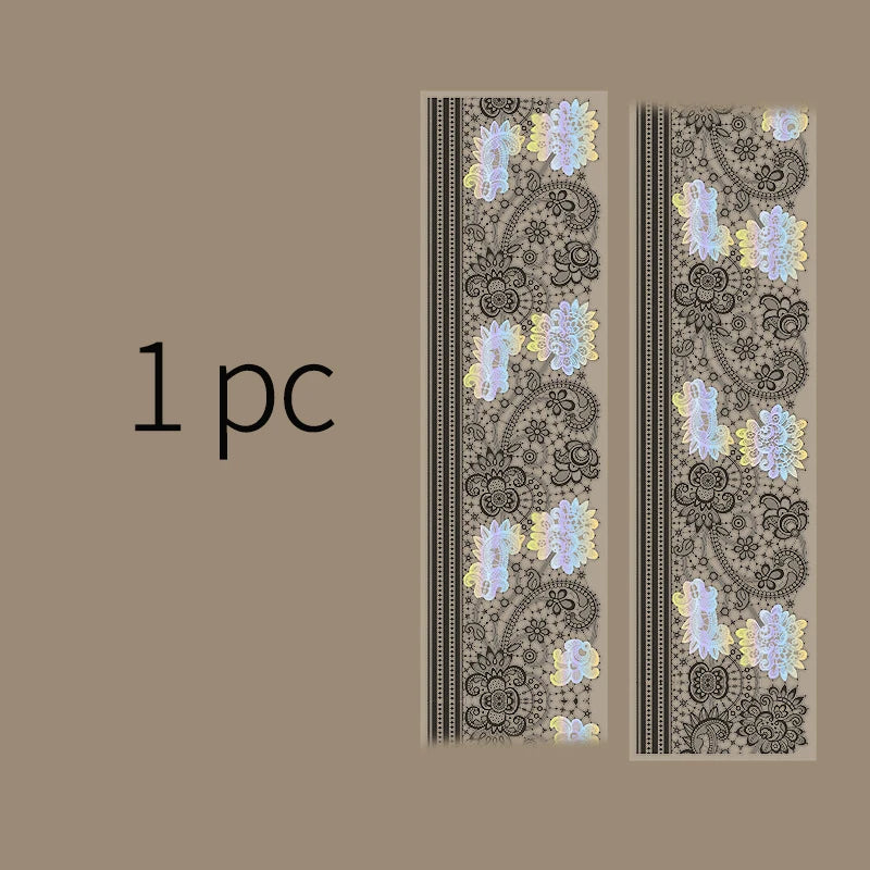 Vertical strip of decorative silver stamping lace tape featuring floral patterns on a beige background.