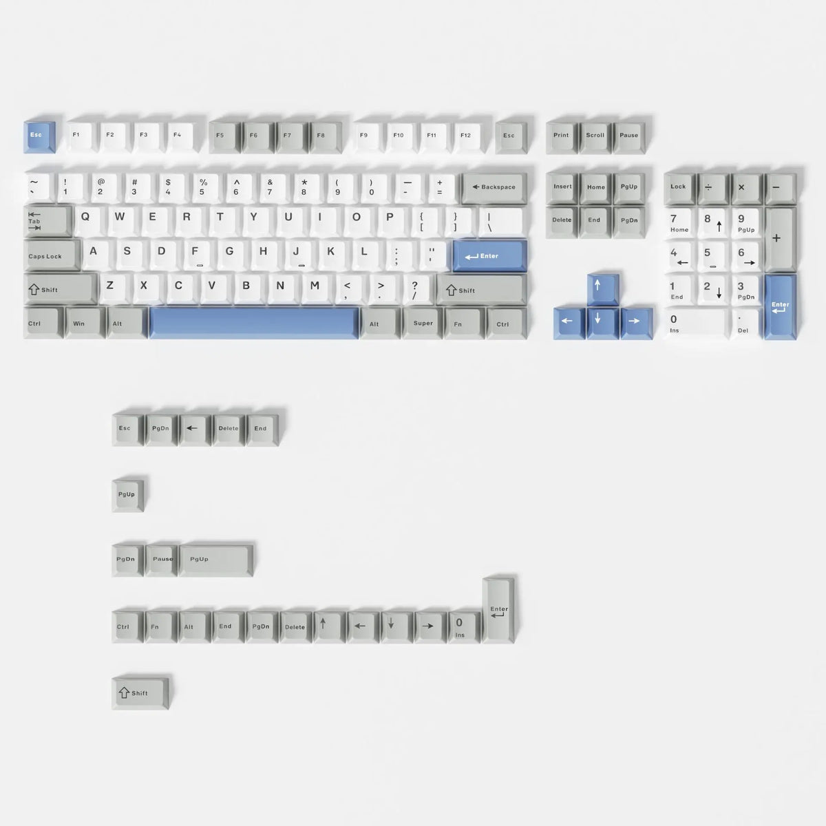 A close-up view of dark blue PBT keycaps with cherry profile for mechanical keyboards.