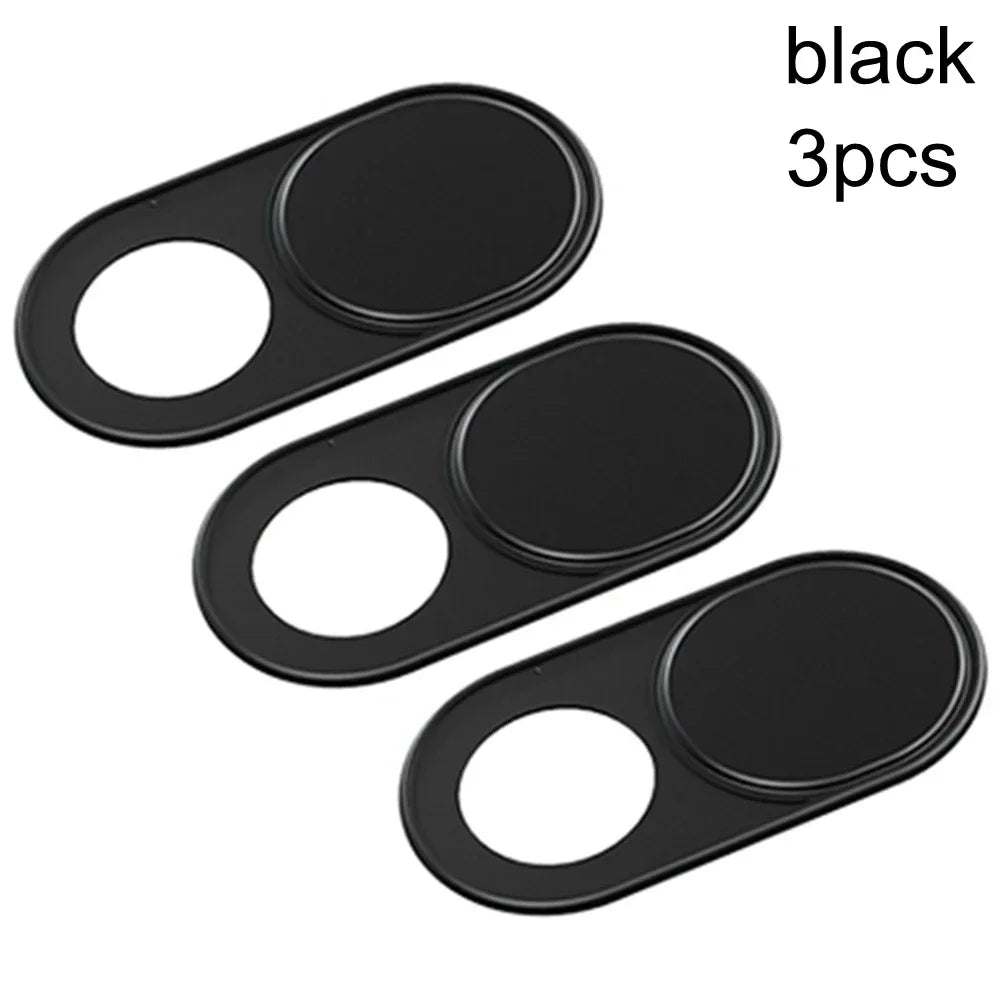 Three black slim camera sliders or privacy covers.
