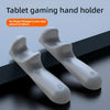 A pair of white silicone tablet gaming hand holders showing the grip design.
