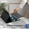 A black magnetic keyboard case for an iPad showing a detachable wireless keyboard being used on a white desk.