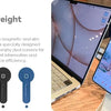 Three versions of a magnetic phone stand designed for laptops and monitors shown next to a tablet.