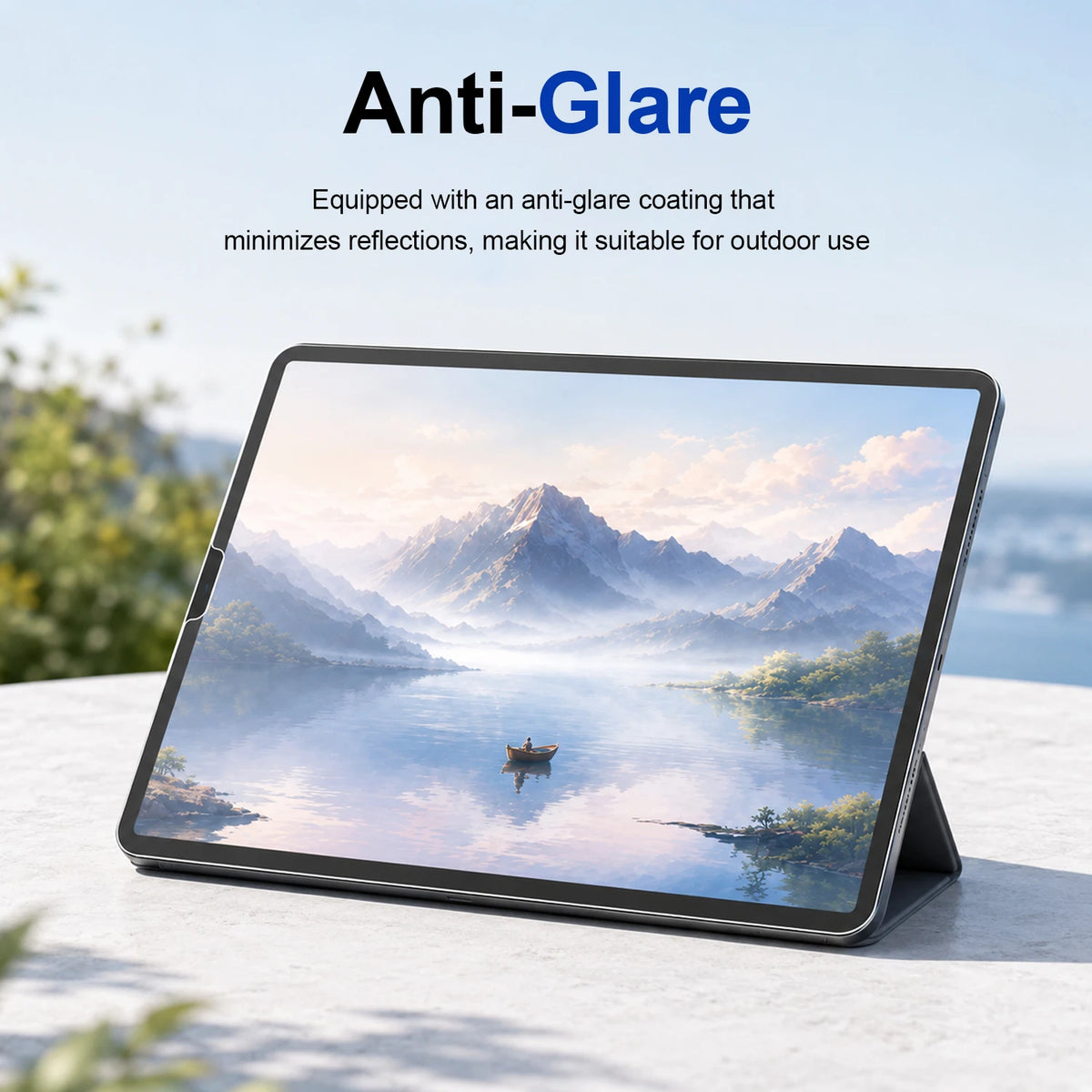 iPad de Apple con recubrimiento antirreflejo mostrando un reflejo de paisaje montañoso brumoso.