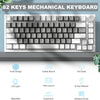 A close-up view of an AJAZZ AK820 mechanical keyboard featuring a rotary volume knob and various features.