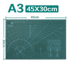 A green A3 cutting mat measuring 45x30cm with grid lines and various crafting symbols.