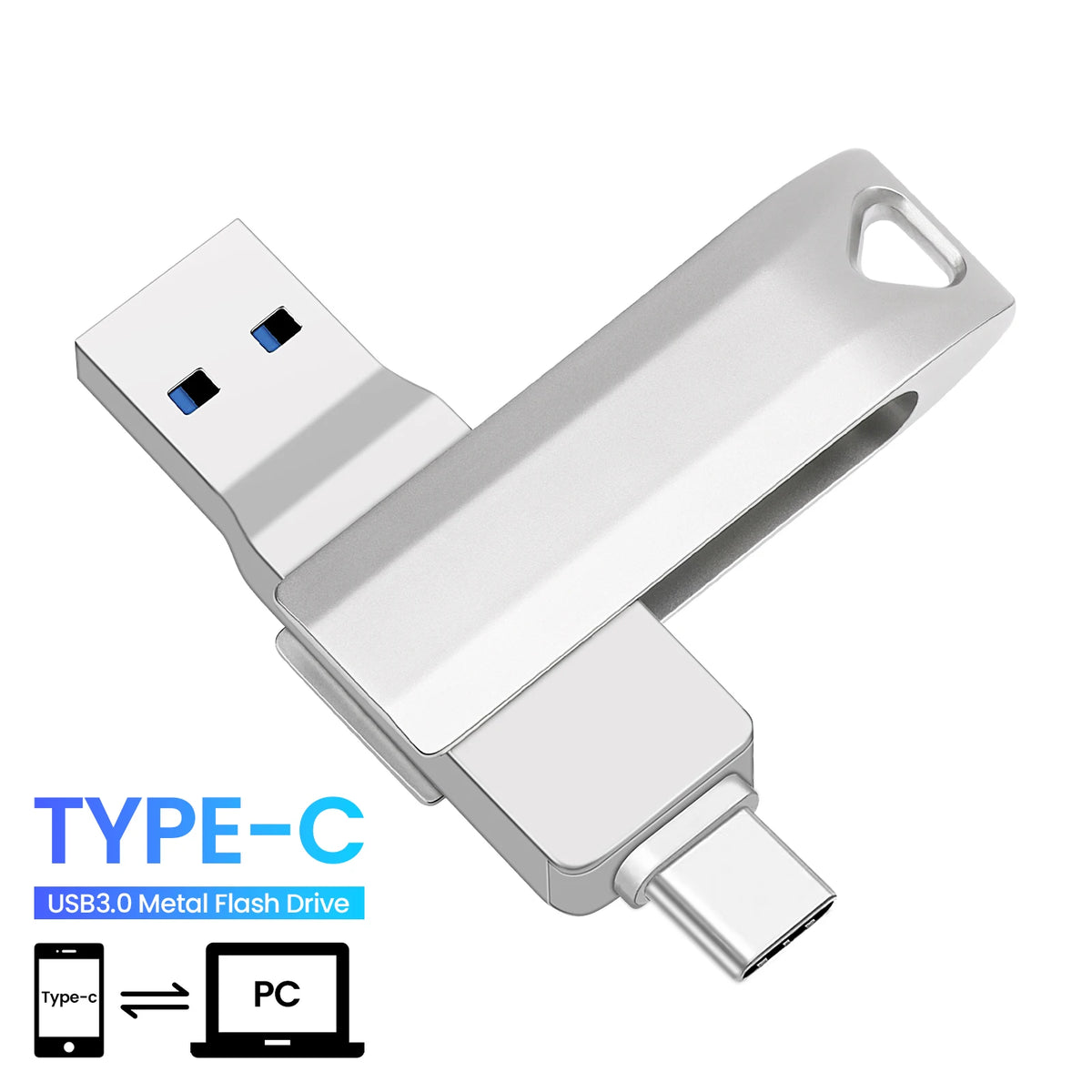 A silver USB-C metal flash drive shown next to a laptop, illustrating the Type-C connection.