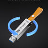 Kodak metal USB flash drive with a leather rope lanyard shown rotating on a dark background.