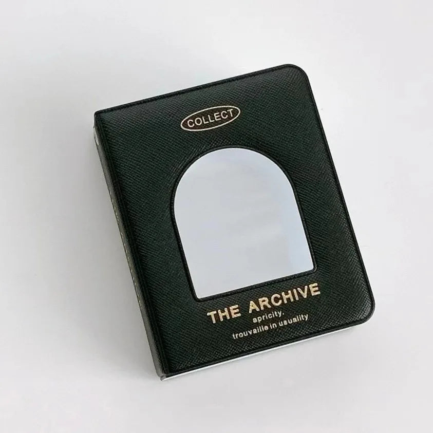 Black hollow photo card binder with a clear window and text reading The Archive