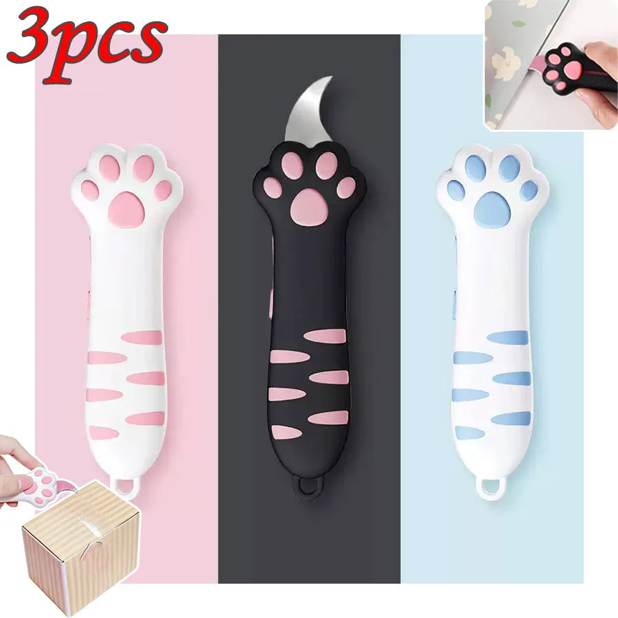 Three silicone cat paw shaped mini box cutters in pink and white colors shown with packaging.
