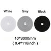 Three spools of hook and loop cable ties in white, grey, and black.