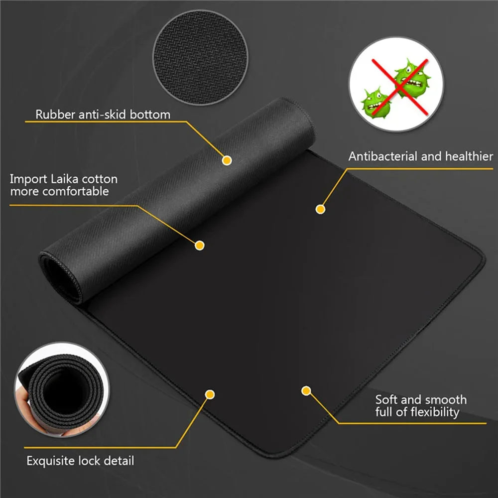Black extended gaming desk mat featuring rubber anti-skid bottom, antibacterial properties, and smooth fabric.