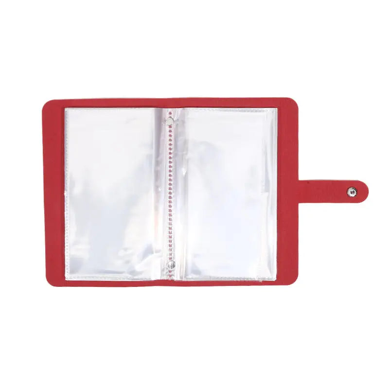 A red reusable envelope binder with a clear plastic pocket and a zipper closure.
