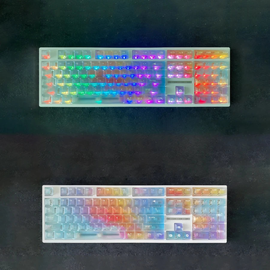 A close-up view of a colorful Rainbow Shine PC keycap set for a mechanical keyboard, showing various colored plastic keycaps.