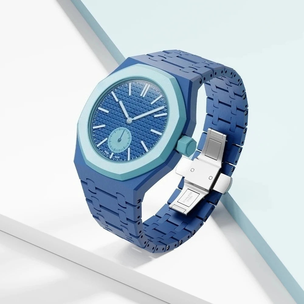 A blue ceramic watch with a blue strap and silver buckle displayed on a light background.