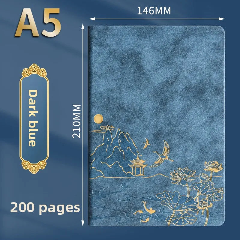 A dark blue luxury PU leather notebook with gold foil illustrations and 200 pages.