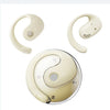 A pair of beige wireless Bluetooth earbuds with a charging case shown in various angles.