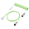 A bright lime green braided cable with USB-C connectors, used for a keyboard or similar device.